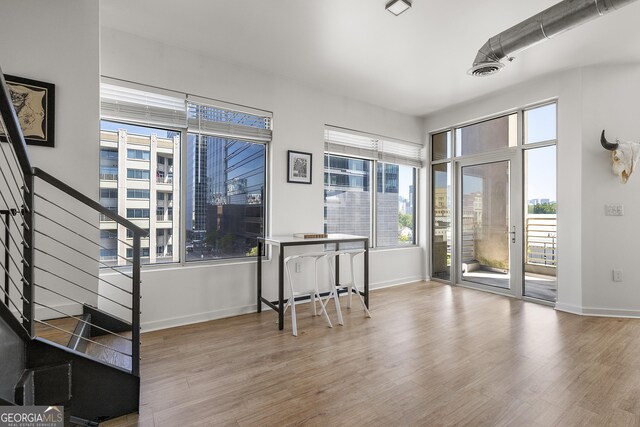 260N 18th St Unit 10326, Atlanta, GA 30363 - entrance foyer with wood finished floors and stairway