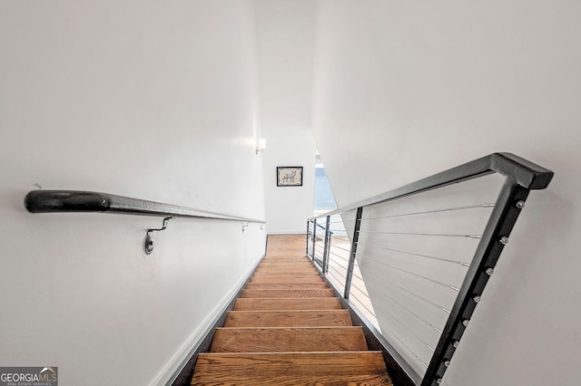 260N 18th St Unit 10326, Atlanta, GA 30363 - stairs featuring wood finished floors and baseboards