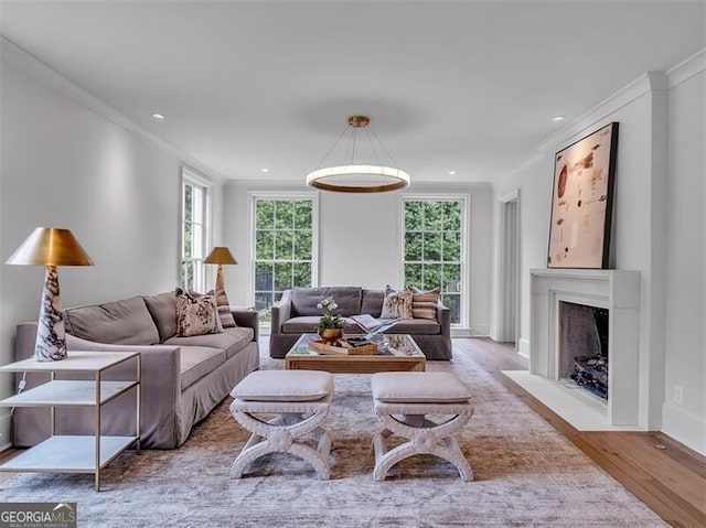 3625 Tuxedo Rd NW, Atlanta, GA 30305 - living room featuring ornamental molding, healthy amount of natural light, wood finished floors, a fireplace with flush hearth, and recessed lighting