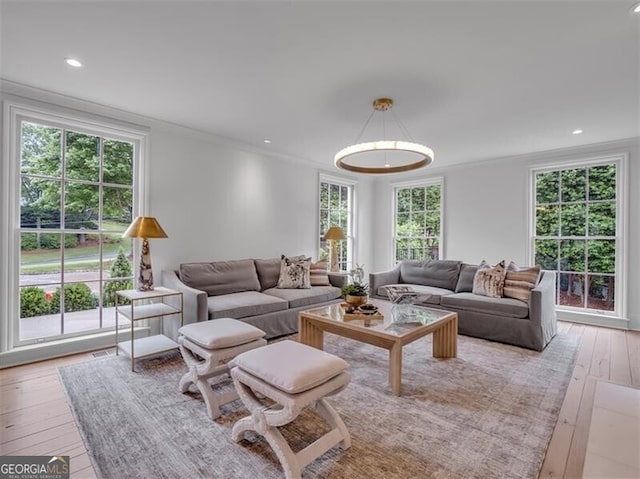 3625 Tuxedo Rd NW, Atlanta, GA 30305 - living area with light wood-type flooring, crown molding, and recessed lighting