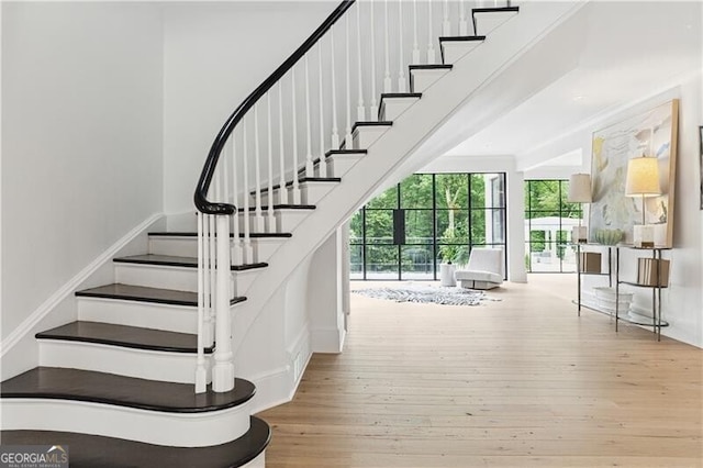 3625 Tuxedo Rd NW, Atlanta, GA 30305 - staircase with wood finished floors
