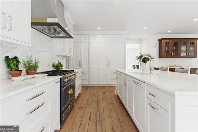 3625 Tuxedo Rd NW, Atlanta, GA 30305 - kitchen with custom exhaust hood, a sink, range with two ovens, white cabinetry, and recessed lighting