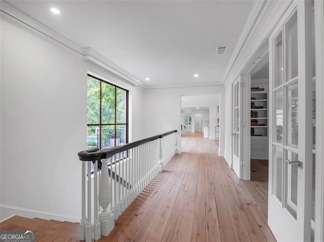 3625 Tuxedo Rd NW, Atlanta, GA 30305 - hallway with ornamental molding, light wood-type flooring, an upstairs landing, baseboards, and recessed lighting