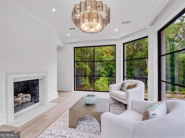 3625 Tuxedo Rd NW, Atlanta, GA 30305 - living room with healthy amount of natural light, wood finished floors, a chandelier, recessed lighting, and baseboards