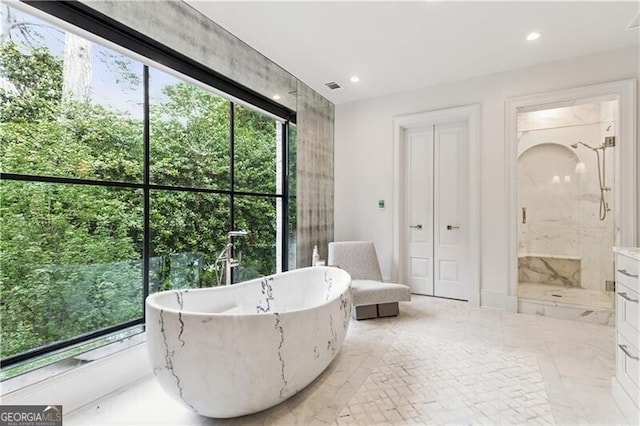 3625 Tuxedo Rd NW, Atlanta, GA 30305 - full bathroom featuring a soaking tub, a marble finish shower, recessed lighting, and marble finish floors