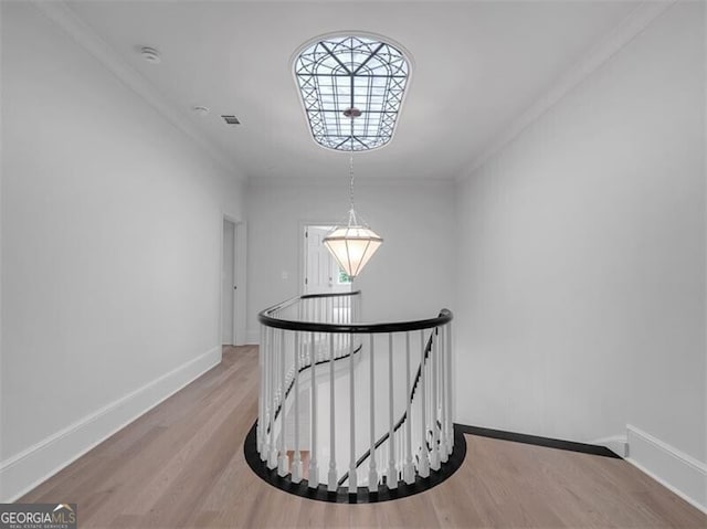 3625 Tuxedo Rd NW, Atlanta, GA 30305 - corridor featuring an upstairs landing, ornamental molding, wood finished floors, and baseboards