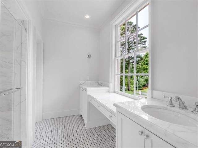 3625 Tuxedo Rd NW, Atlanta, GA 30305 - bathroom with a marble finish shower, vanity, and tile patterned floors