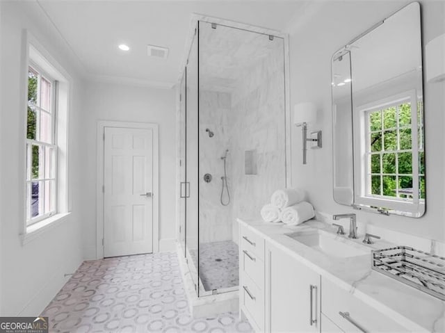 3625 Tuxedo Rd NW, Atlanta, GA 30305 - full bath with plenty of natural light, a marble finish shower, vanity, ornamental molding, and recessed lighting
