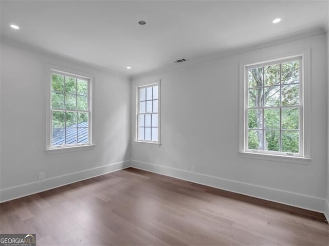 3625 Tuxedo Rd NW, Atlanta, GA 30305 - unfurnished room featuring ornamental molding, wood finished floors, baseboards, and recessed lighting