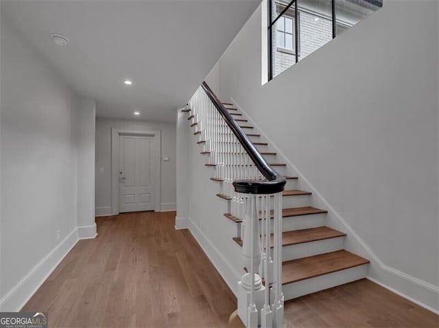 3625 Tuxedo Rd NW, Atlanta, GA 30305 - staircase featuring wood finished floors, baseboards, and recessed lighting