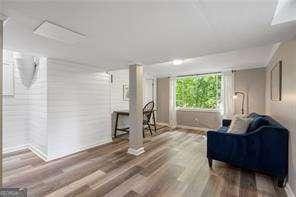 sitting room featuring wood finished floors