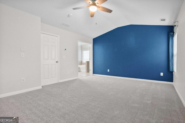 456 Crestmont Ln, Canton, GA 30114 - unfurnished bedroom featuring carpet flooring, vaulted ceiling, and a ceiling fan