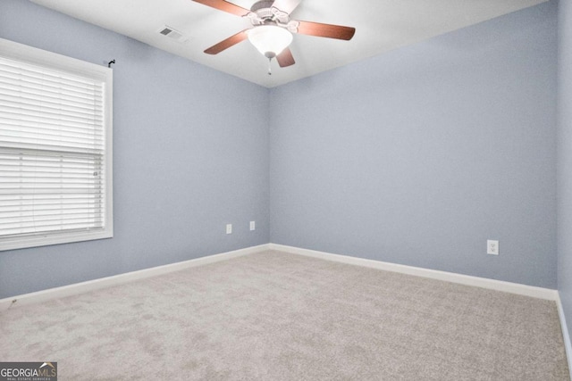 456 Crestmont Ln, Canton, GA 30114 - carpeted empty room with a ceiling fan and baseboards
