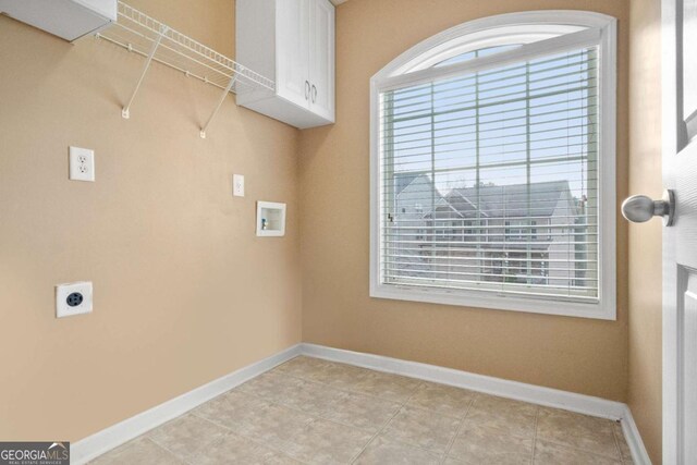 456 Crestmont Ln, Canton, GA 30114 - washroom featuring cabinet space, electric dryer hookup, washer hookup, and light tile patterned flooring