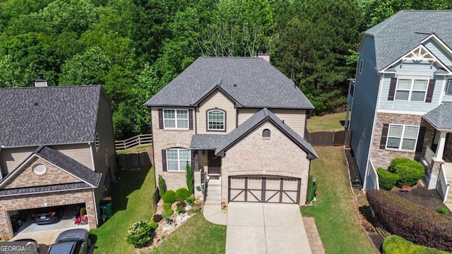 456 Crestmont Ln, Canton, GA 30114 - view of front facade with concrete driveway and a shingled roof