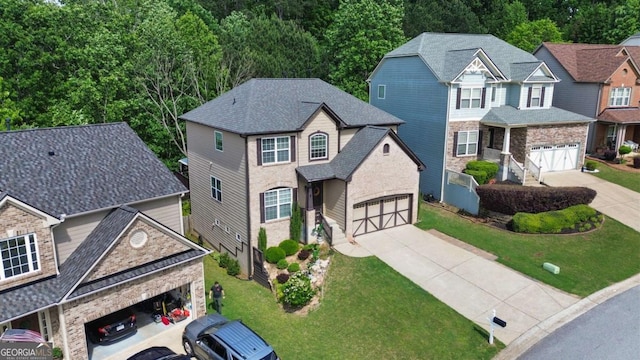 456 Crestmont Ln, Canton, GA 30114 - view of front facade featuring driveway, a garage, a front lawn, and a residential view