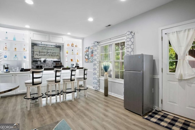 456 Crestmont Ln, Canton, GA 30114 - kitchen featuring freestanding refrigerator, white cabinetry, light wood-type flooring, and recessed lighting