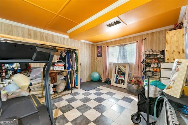 4882 Rock Haven Dr SW, Lilburn, GA 30047 - exercise room with wood walls and ornamental molding