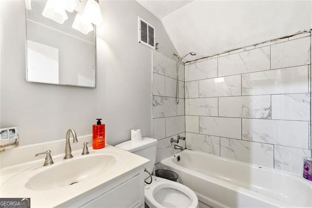 4882 Rock Haven Dr SW, Lilburn, GA 30047 - bathroom with lofted ceiling, shower / washtub combination, toilet, and vanity