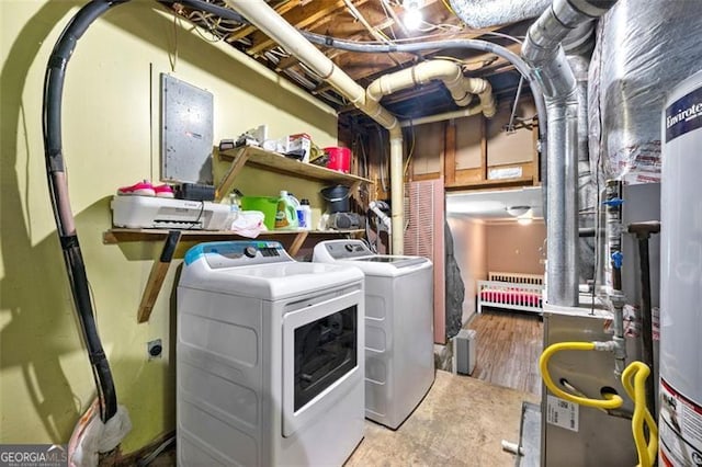 4882 Rock Haven Dr SW, Lilburn, GA 30047 - clothes washing area featuring washing machine and clothes dryer