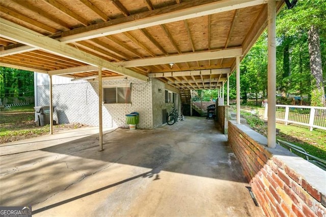 4882 Rock Haven Dr SW, Lilburn, GA 30047 - view of patio with a carport