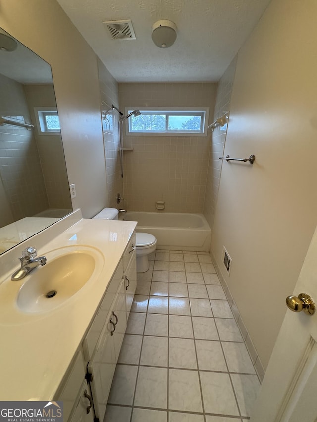 143 Tracy Ln, Mcdonough, GA 30253 - bathroom with toilet, shower / washtub combination, tile patterned floors, and vanity