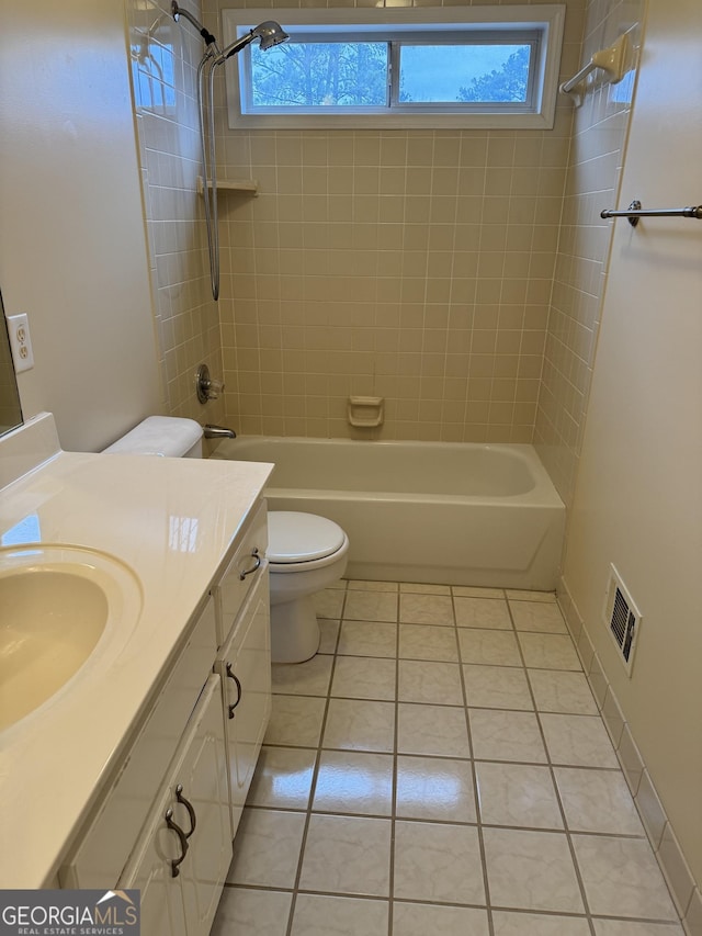 143 Tracy Ln, Mcdonough, GA 30253 - bathroom with shower / bathtub combination, tile patterned floors, toilet, and vanity