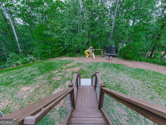2700 Sam Nelson Rd, Canton, GA 30114 - view of home's community featuring a trampoline, a playground, and a lawn