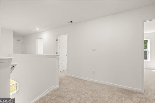 45 Vermillion Way, Covington, GA 30016 - empty room featuring light carpet and recessed lighting