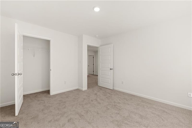 45 Vermillion Way, Covington, GA 30016 - unfurnished bedroom featuring light colored carpet, a closet, and recessed lighting