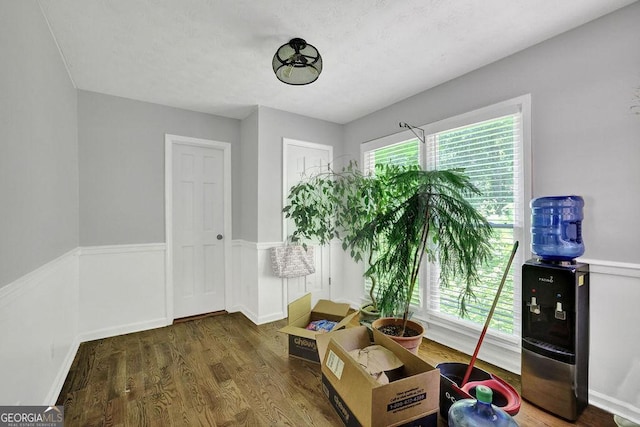 1315 Arden Dr SW, Marietta, GA 30008 - living area with wood finished floors and a wainscoted wall