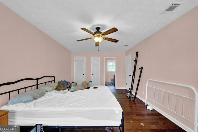 1315 Arden Dr SW, Marietta, GA 30008 - bedroom with wood finished floors, baseboards, and a ceiling fan