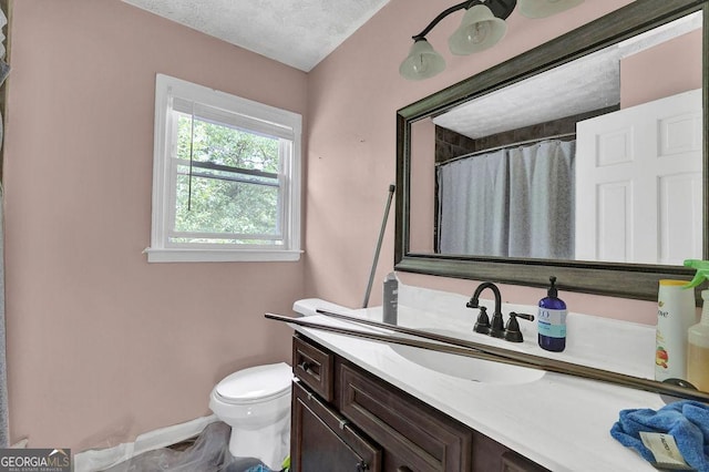 1315 Arden Dr SW, Marietta, GA 30008 - full bath featuring toilet, vanity, baseboards, and a shower with curtain