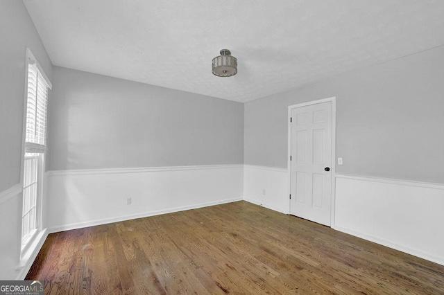 1315 Arden Dr SW, Marietta, GA 30008 - spare room with wood finished floors and baseboards