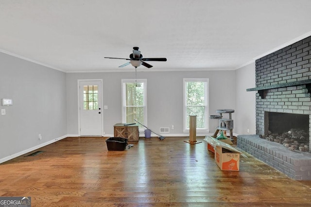 1315 Arden Dr SW, Marietta, GA 30008 - living room featuring wood finished floors, a ceiling fan, healthy amount of natural light, ornamental molding, and baseboards