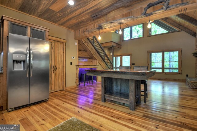 179 Huckleberry Ln, Ellijay, GA 30536 - kitchen with stainless steel fridge, wooden ceiling, lofted ceiling, light wood-type flooring, and recessed lighting