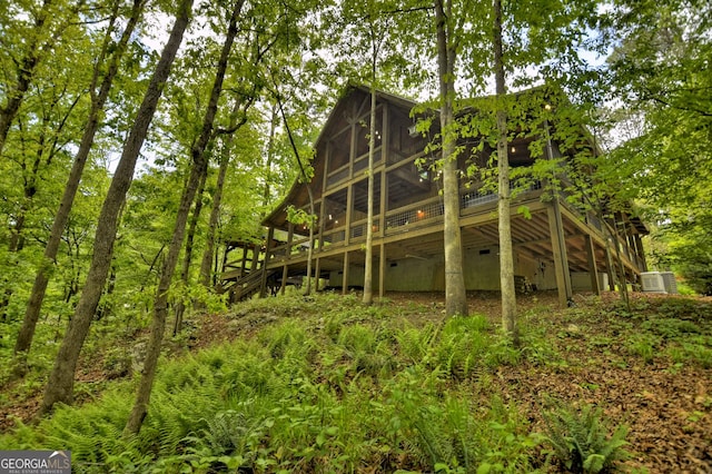 179 Huckleberry Ln, Ellijay, GA 30536 - rear view of property featuring a sunroom, a deck, and stairway