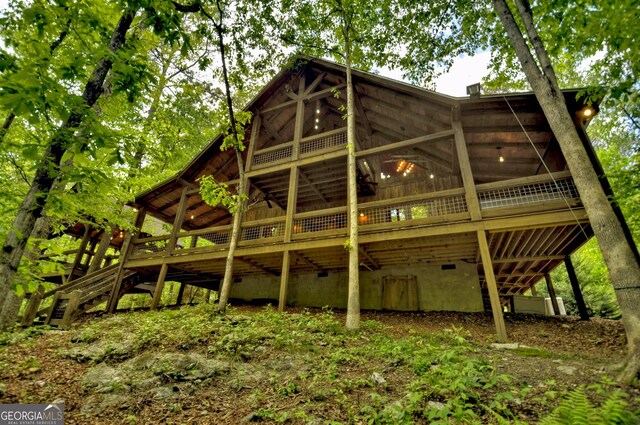 179 Huckleberry Ln, Ellijay, GA 30536 - view of side of home featuring a sunroom, crawl space, and a deck