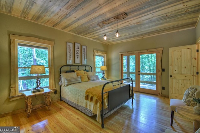 179 Huckleberry Ln, Ellijay, GA 30536 - bedroom featuring multiple windows, french doors, wooden ceiling, and wood finished floors