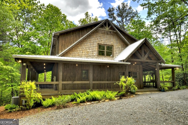 179 Huckleberry Ln, Ellijay, GA 30536 - view of front of house with a sunroom and metal roof