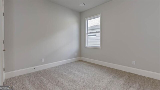 116 Four Seasons Blvd, Dallas, GA 30132 - empty room featuring carpet floors and baseboards