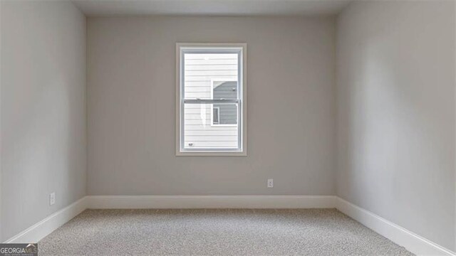 116 Four Seasons Blvd, Dallas, GA 30132 - unfurnished room featuring carpet floors, healthy amount of natural light, and baseboards