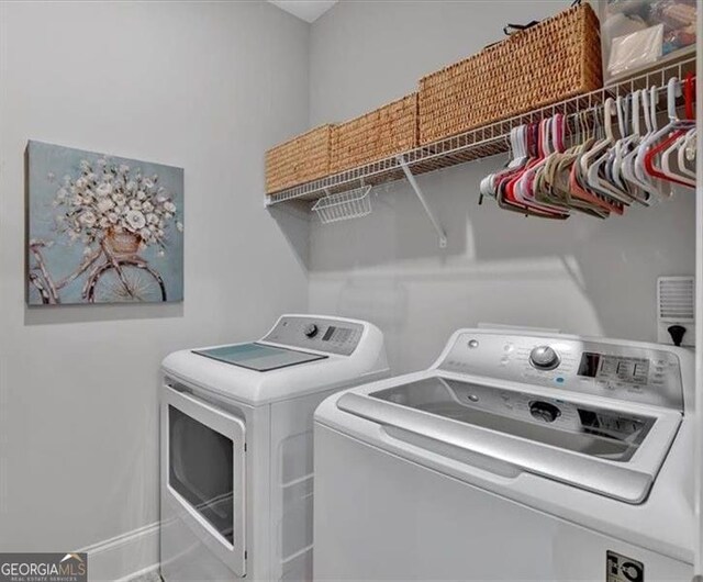 116 Four Seasons Blvd, Dallas, GA 30132 - washroom with washer and dryer and baseboards