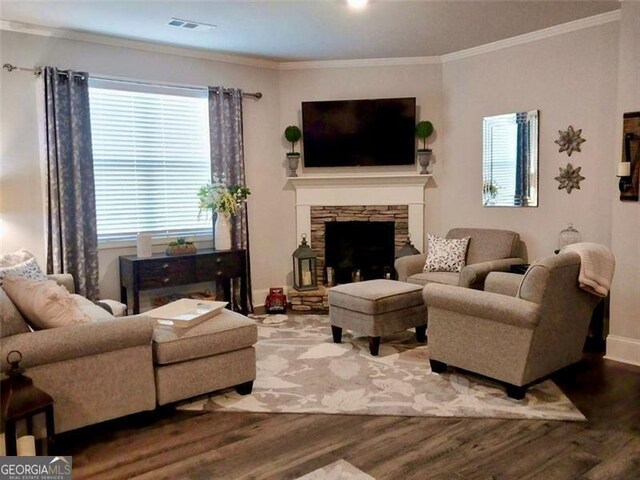 116 Four Seasons Blvd, Dallas, GA 30132 - living area with wood finished floors, crown molding, baseboards, and a stone fireplace