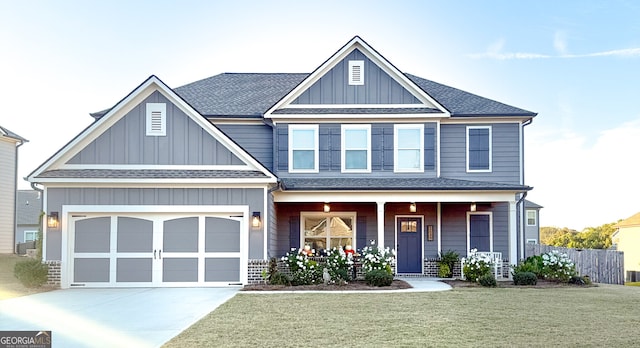 view of front of house with board and batten siding, driveway, roof with shingles, covered porch, and a garage