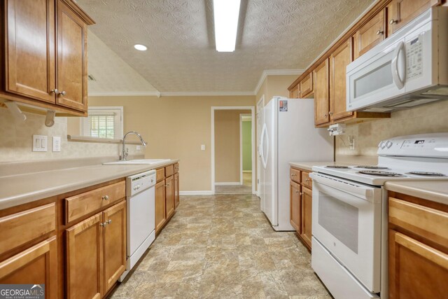 kitchen featuring white appliances, a sink, brown cabinetry, decorative backsplash, and crown molding