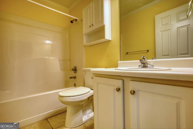 bathroom with crown molding, tile patterned floors, vanity, toilet, and tub / shower combination