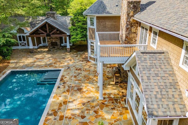 outdoor pool featuring a patio area