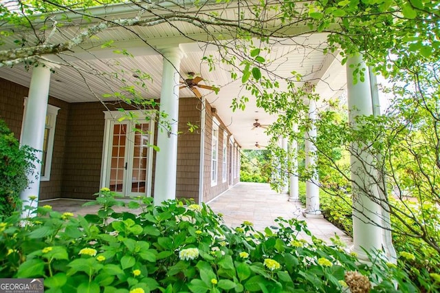 view of patio / terrace with french doors and a porch