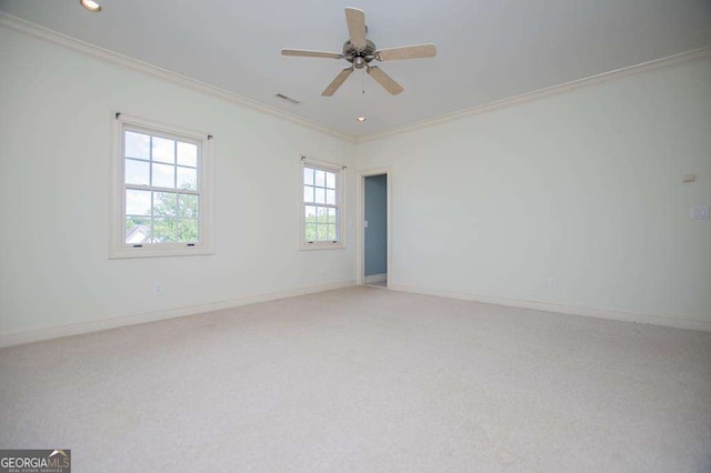 unfurnished room with crown molding, light colored carpet, baseboards, ceiling fan, and recessed lighting